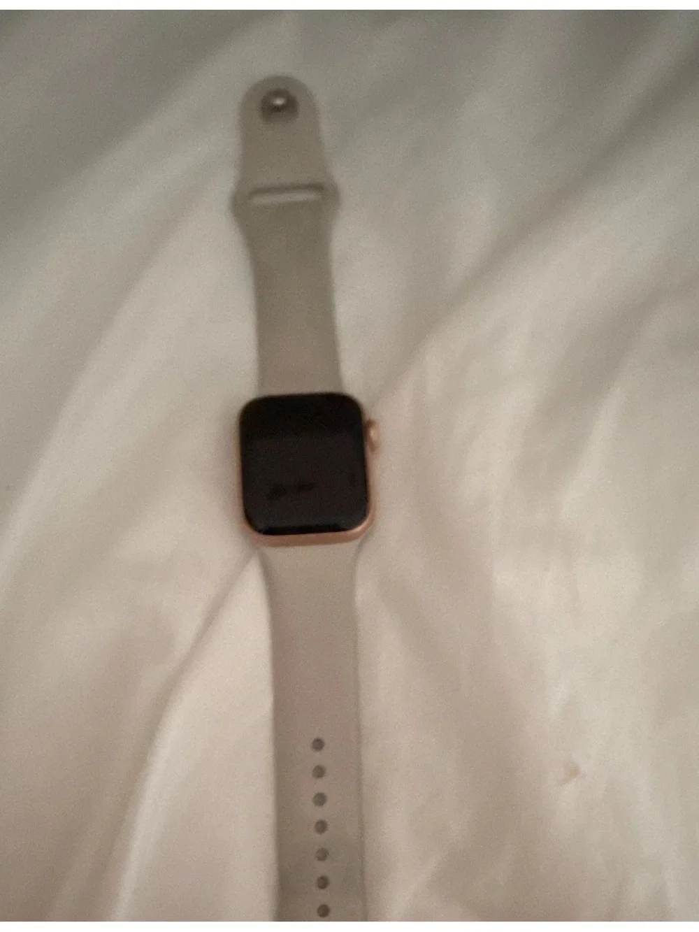 Smartwatch with Light Gray Silicone Band and Rose Gold Case